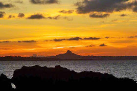 Sun going down behind Ie Island Okinawa