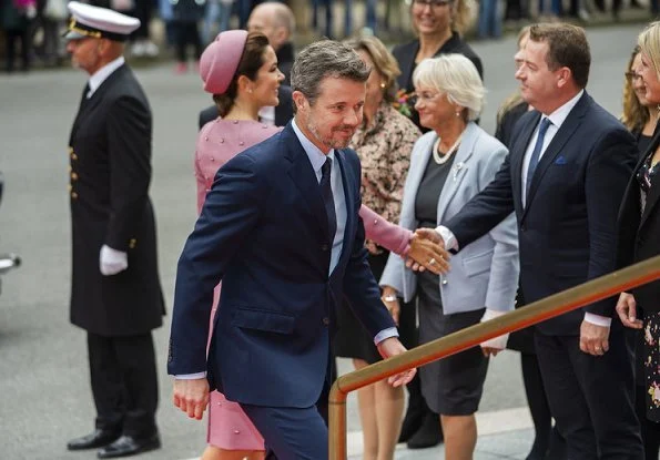 Queen Margrethe, Crown Prince Frederik and Princess Benedikte. Crown Princess Mary wore Claes Iversen coat