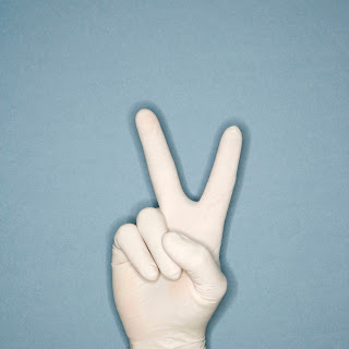Peace sign; seeking peace; human hand