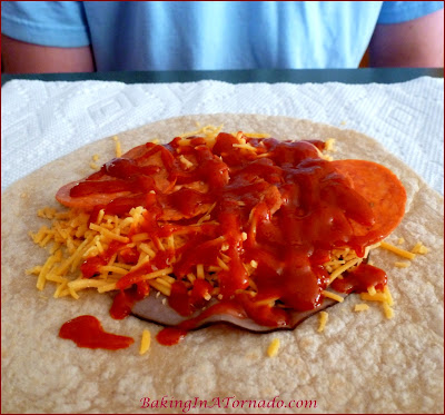 My Boys Cook, a humorous look at young men in the kitchen | PurDude's Drowning in Sriracha Wrap | www.BakingInATornado.com | #humor #funny