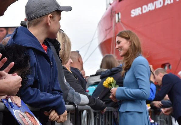 Kate Middleton wore a cornflower blue coat by Alexander McQueen. Emmy London Josie shoes Mappin and Webb empress drop earrings