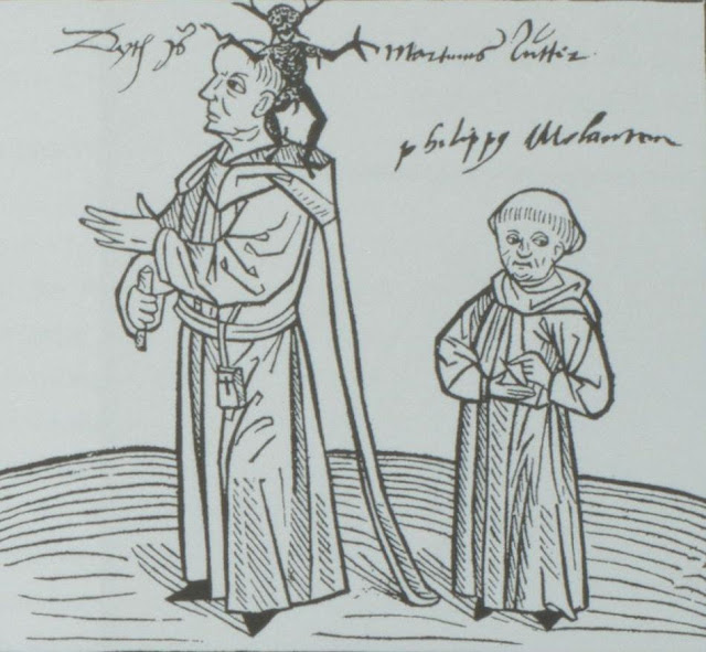 (10). Позднейшая надпись, сделанная от руки:  «Это – Мартин Лютер».  Монах справа подписан как Филипп Меланхтон,  известный последователь Лютера.   Иоанн Лихтенбергер. «Предзнаменование». Майнц, 1492.