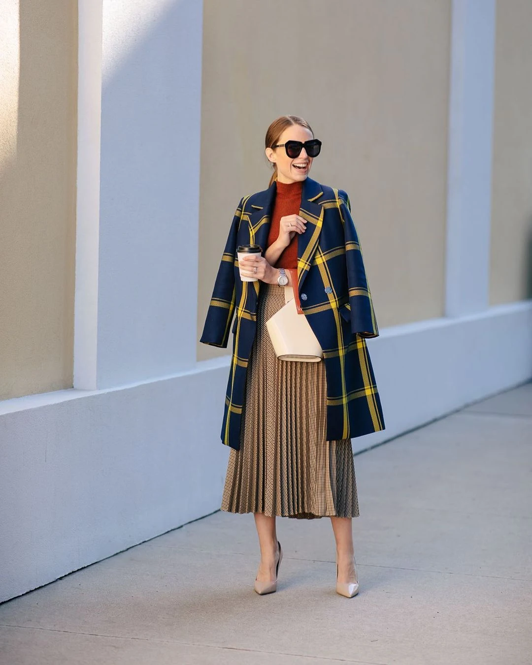 Plaid coat and pleated skirt