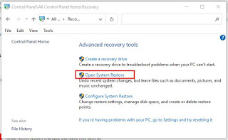 Klik Open System Restore
