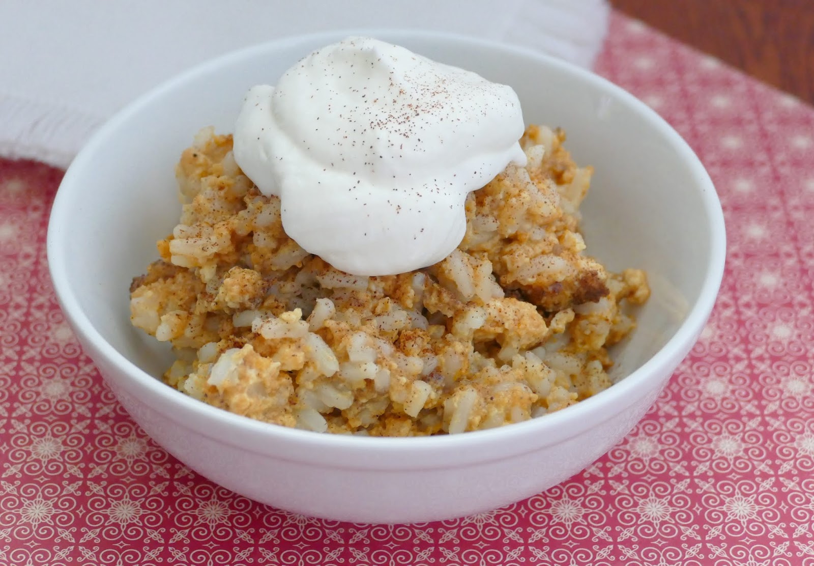 This fall pumpkin dessert pudding is delicious and so easy to make! It's a great way to use leftover rice and it's best with whipped cream and cinnamon sprinkled on top!
