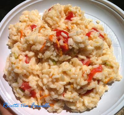 risotto cremoso con fiori e acciughe