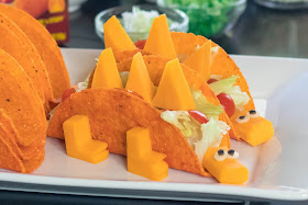 Easy and fun slow cooker dinosaur tacos for National Taco Day or any family dinner night!