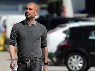 Pep Guardiola: Manchester City boss named manager of the year/ Pep Guardiola: Bos Manchester City terpilih sebagai manajer terbaik tahun ini.