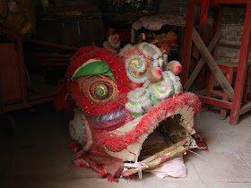 head of a red traditional Chinese lion costume