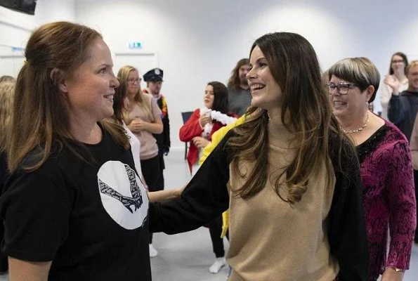 Princess Sofia wore 2ndDay Checked Duster Coat. Frödingskolan School in Kronopark. secondary school teacher Soran Afrasiabi