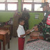 Peduli Dengan Pendidikan Di Papua, Satgas Yonif 512/QY Bagikan Buku Tulis Di SD Pir IV