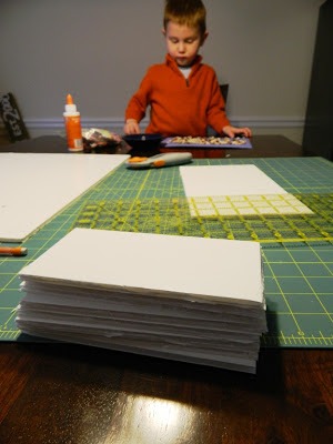 DIY Peg Board Game: A stack of blank cards, some glue, and a plastic ruler