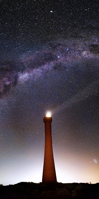 HD Galaxy wallpaper above the lighthouse HD Galaxy wallpaper above the lighthouse