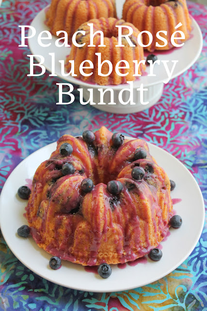Food Lust People Love: Tender peachy crumb is perfectly complemented by the juicy blueberries with a hint of rosé wine in this buttery pound cake I’m calling Peach Rosé Blueberry Bundt. You can bake it as one cake in a 10-cup pan or as mini and small Bundts for sharing.