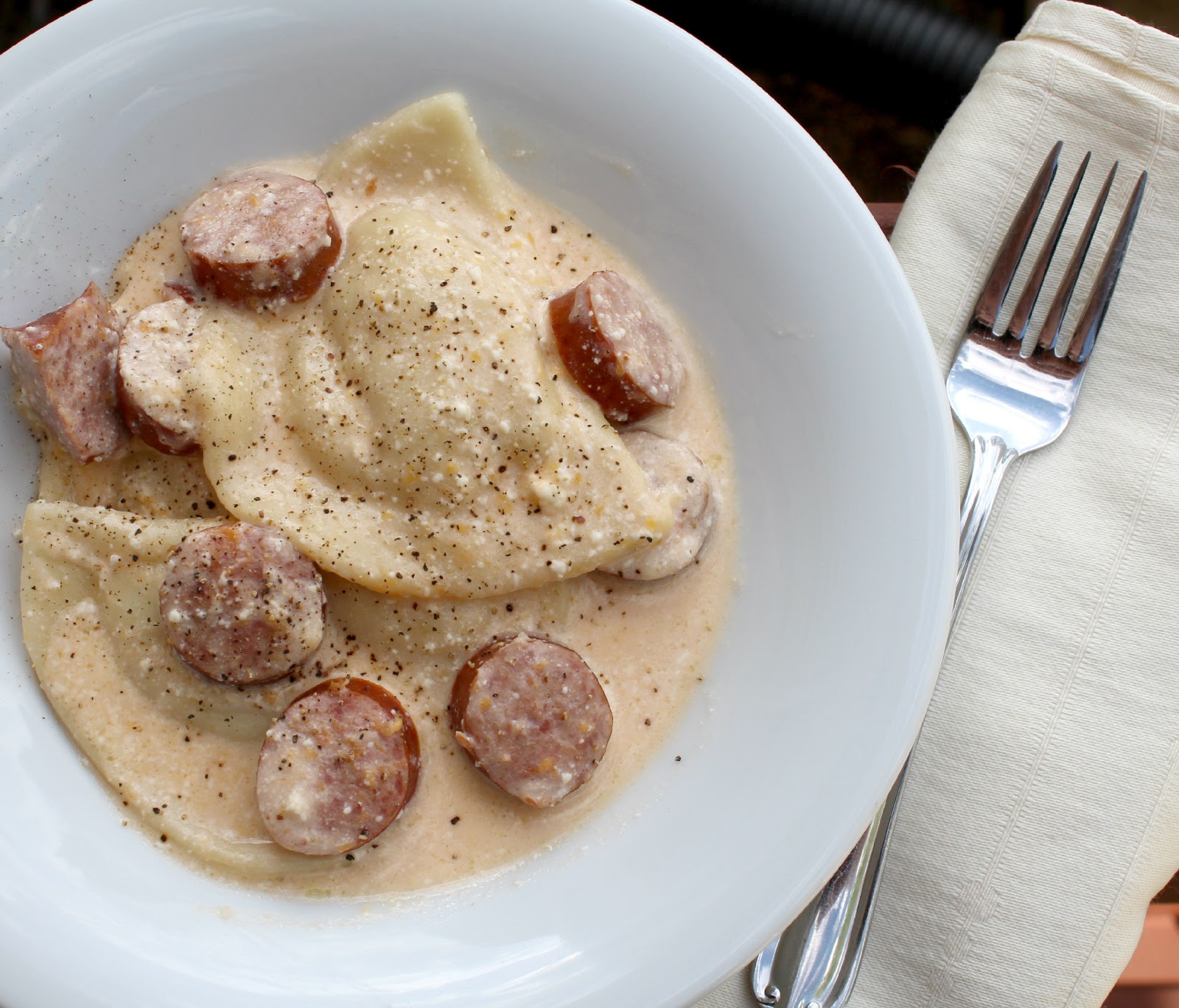 Cheese Curd In Paradise Slowcooker Pierogies and Kielbasa Casserole