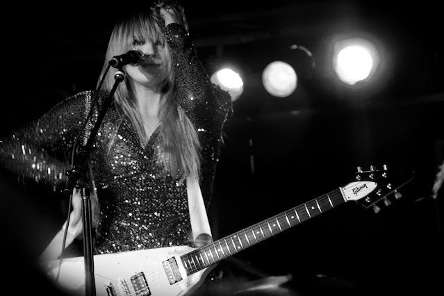 Grace Potter holding electric guitar in black and white in Nashville