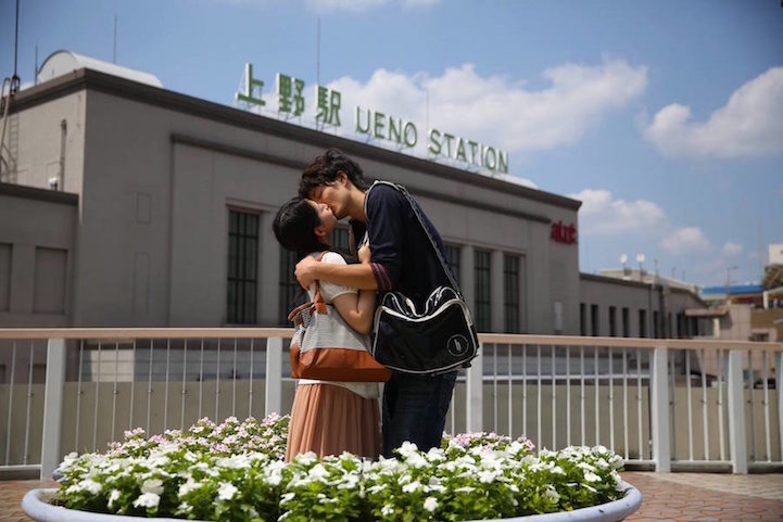 Traveling Photographer Captures Couples Kissing in Public Around the World