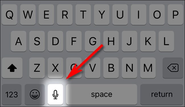 اضغط على زر الميكروفون في لوحة مفاتيح iPhone أو iPad.
