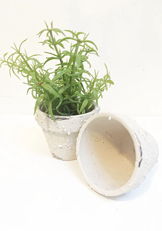 terra cotta pots with faux plant