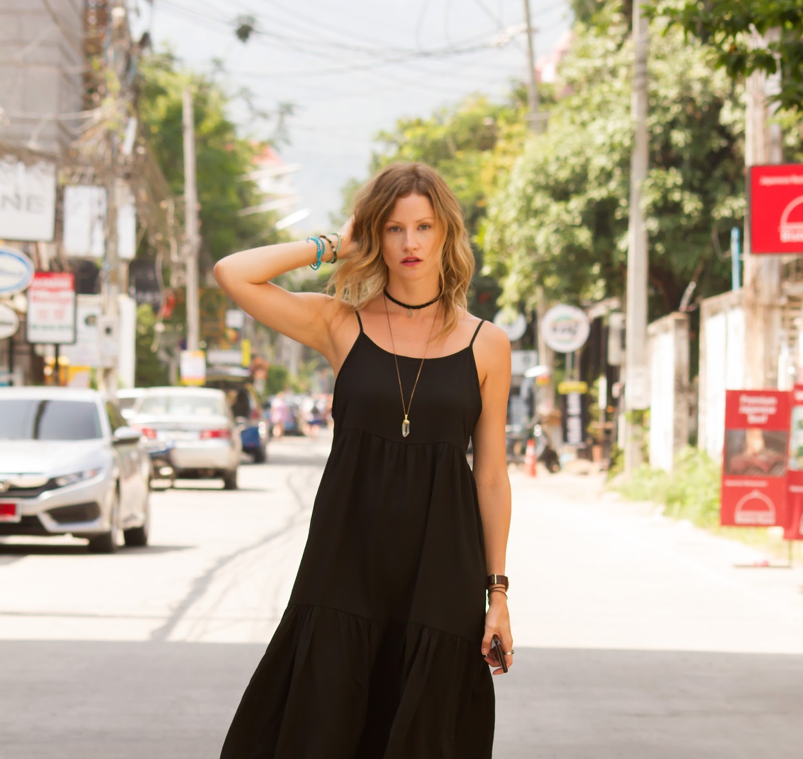 Fashion and Travel Blogger, Alison Hutchinson, is wearing a black dress during the mourning period in Chiang Mai, Thailand