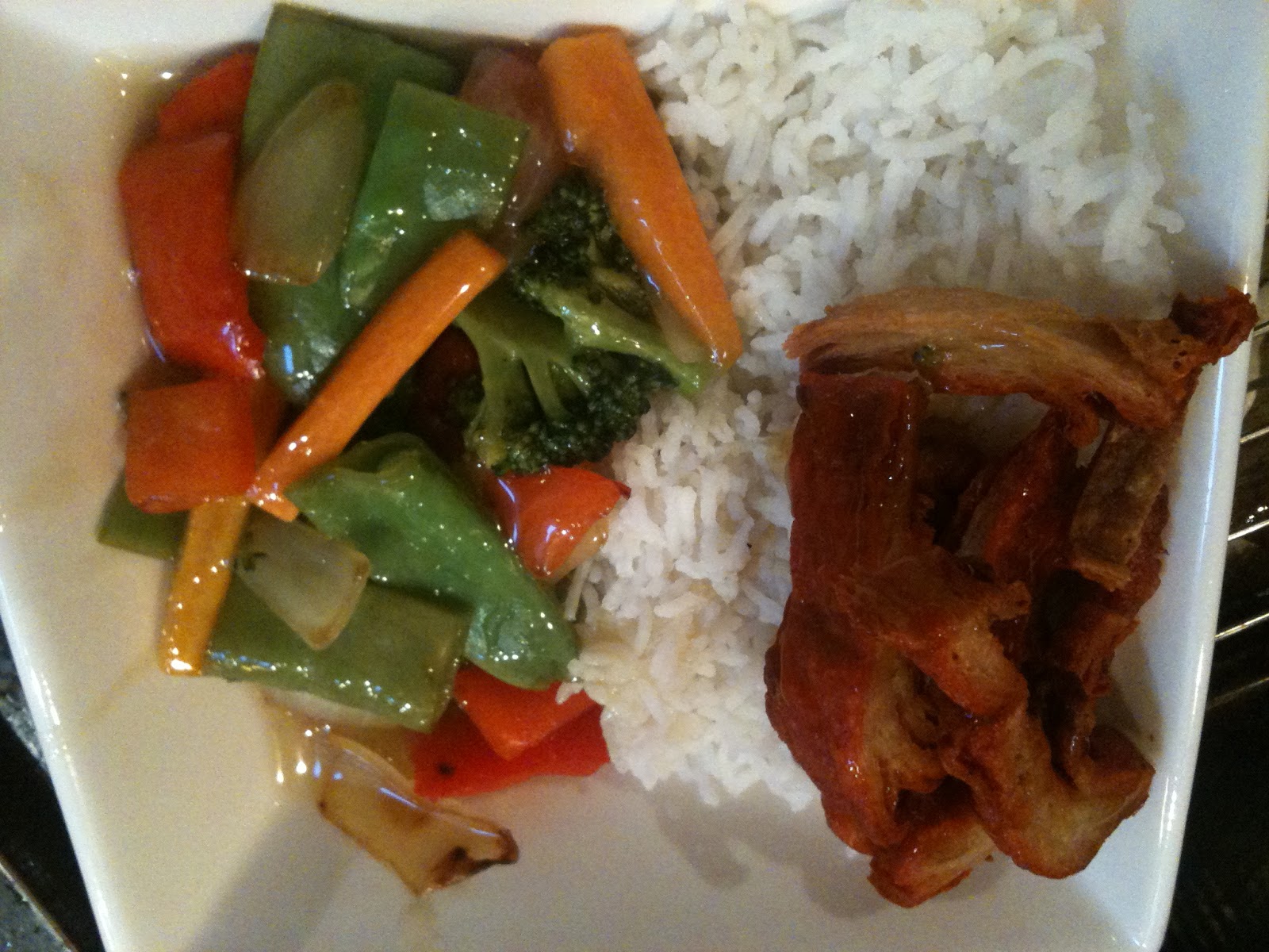 Vegan SJ. Chinese Roast Duck with Steamed Rice and Lemon Stir Fried Veggies.