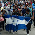 Primeros 110 migrantes de la caravana detenidos en Guatemala regresan a Honduras
