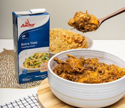 Source: Anchor Food Professionals Malaysia. A bowl of rendang ayam pedas with a pack of Anchor Extra Yield Cooking Cream to the left..