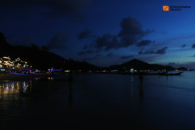 The Dawn of Koh Tao Island, Thailand, last light of the sky, and the light of city is glowing