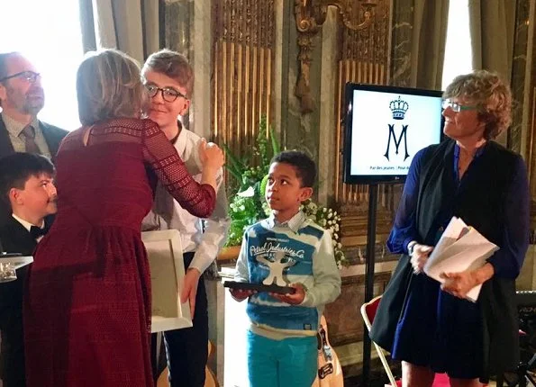 Queen Mathilde presented the 'Queen Mathilde Award' 2017 in a ceremony held at the Royal Palace. Queen wore By Malina Lace dress