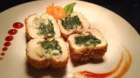 Serving mushroom filled with spinach and cheese for mushroom Duplex recipe