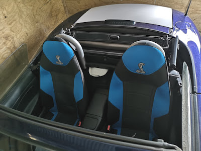 Cobra emblems on Mazda Roadster seat covers