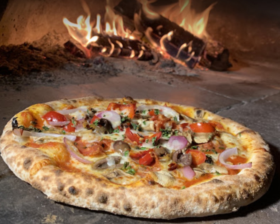 Urge Gastropub offers wood-fired pizzas with diverse toppings.