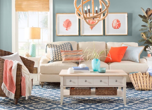 Bright Coastal Living Room with Coral and Rope Chandelier