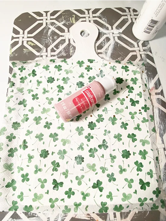 shamrock napkin on cutting board shape with paint roller