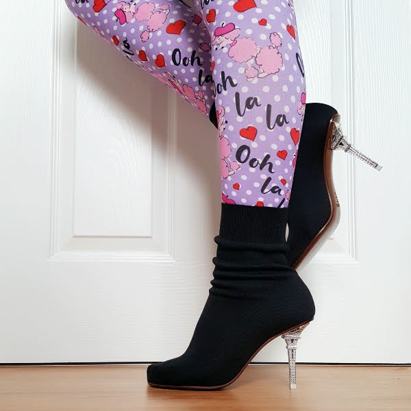 wearing black knit ankle boots with Eiffel Tower heel and Paris poodle tights