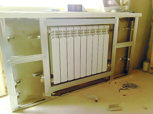 Как спрятать радиаторы отопления 