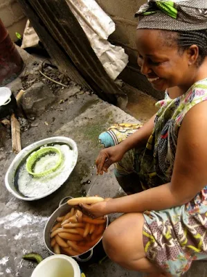 Happily cooking in Cameroon