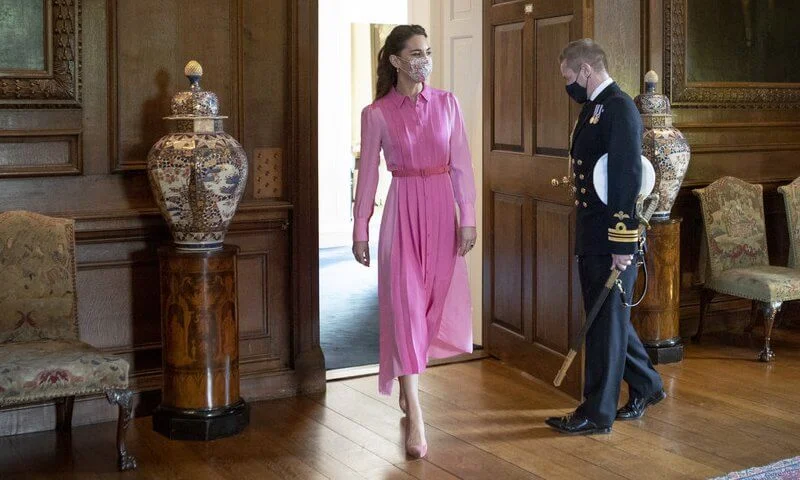 Kate Middleton wore a new bubblegum pink silk shirt dress from Me + Em, and lollipop skinny belt from Boden