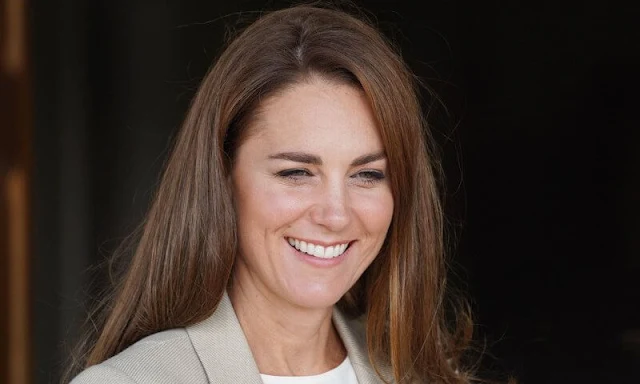 Kate Middleton wore a new double-breasted blazer by Reiss Larsson, and high waisted sport luxe trousers by Jigsaw