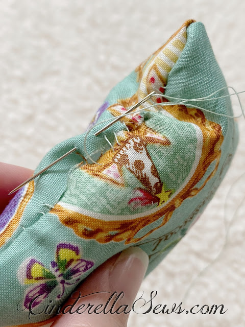 Tiny Quilt and Pillow Sewing Pattern for dolls and softies! This free PDF sewing pattern is for hand-sewing beginners and heirloom doll enthusiasts. A sweet afternoon sewing project to do with or without kids, hand stitching is a wonderful mindfulness exercise. #sewasoftie #handsewing #sewing #sewingpattern #sewingproject #sewingwithkids 