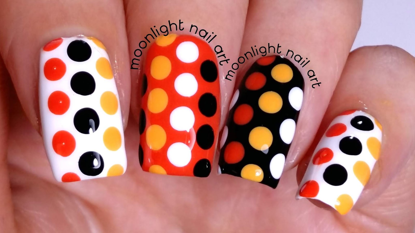 Polka Dots Design: Orange, Black and White Nail Art