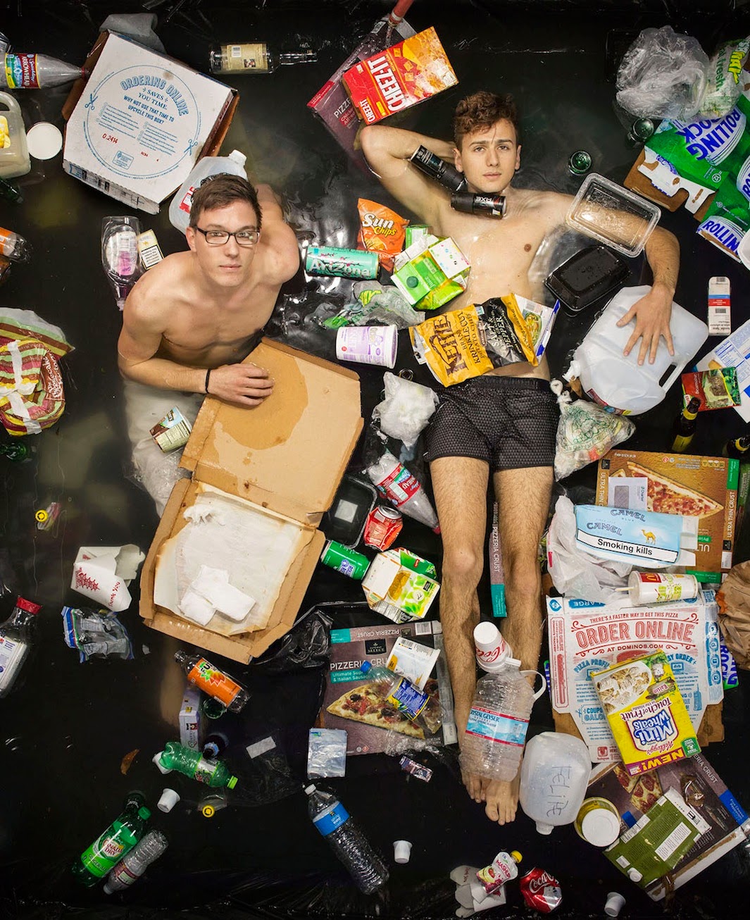 How to Recycle People Pose in The Garbage They Created Weekly