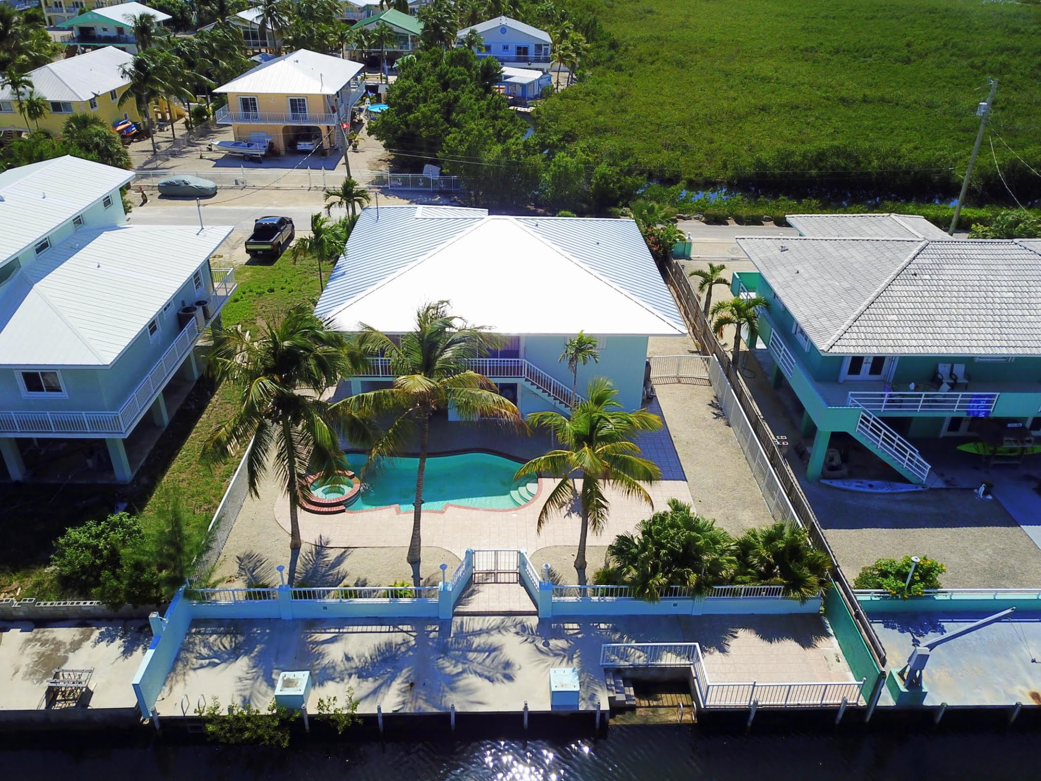 Real Estate in the Florida Keys 3/2 CBS Key Largo Canal front 940K