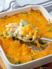 Cheese topped broccoli casserole served on a spoon