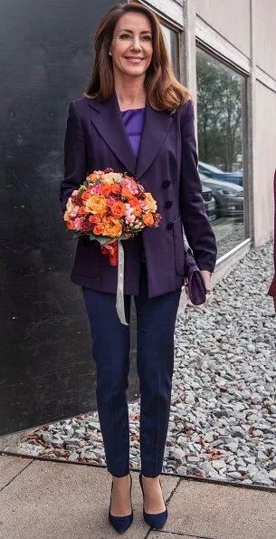 Princess Marie wore Emporio Armani dark purple blazer, Jimmy Choo suede pumps, and she carried Naledi Copenhagen Ostrich clutc