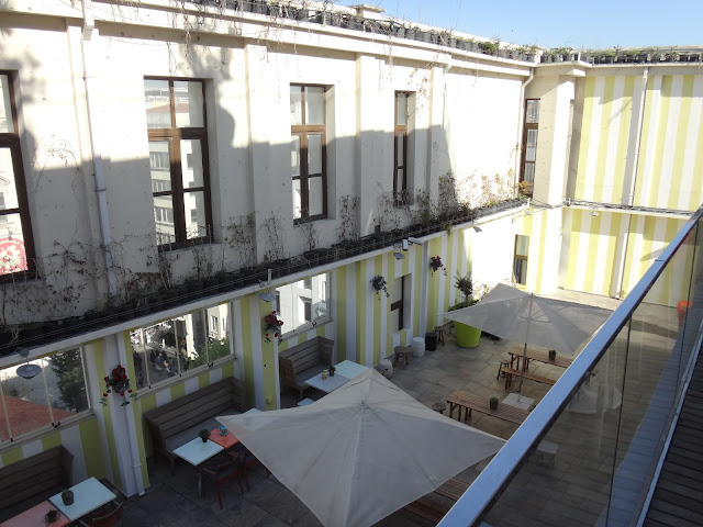 The heritage is preserved on the exterior building but the interior is modified into a boutique hotel along Istiklal Street in Istanbul, Turkey The heritage is preserved on the exterior building but the interior is modified into a boutique hotel along Istiklal Street in Istanbul, Turkey