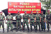 Yonmarhanlan VIII Kirim 1 SST Marinir Bantu Korban Banjir Bandang di Bolmut
