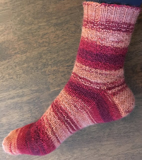 Socks are knitted with DROPS Fabel Grand Canyon, Hermione pattern, asymmetrical wedge toes, and traditional heel flap