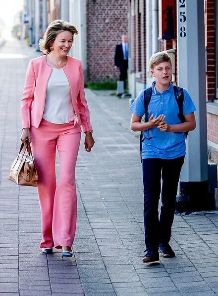 Queen Mathilde wore Giorgio Armani silk jacket and silk trousers