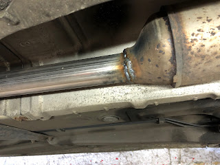 New pipe welded on to corroded catalytic converter VW Golf